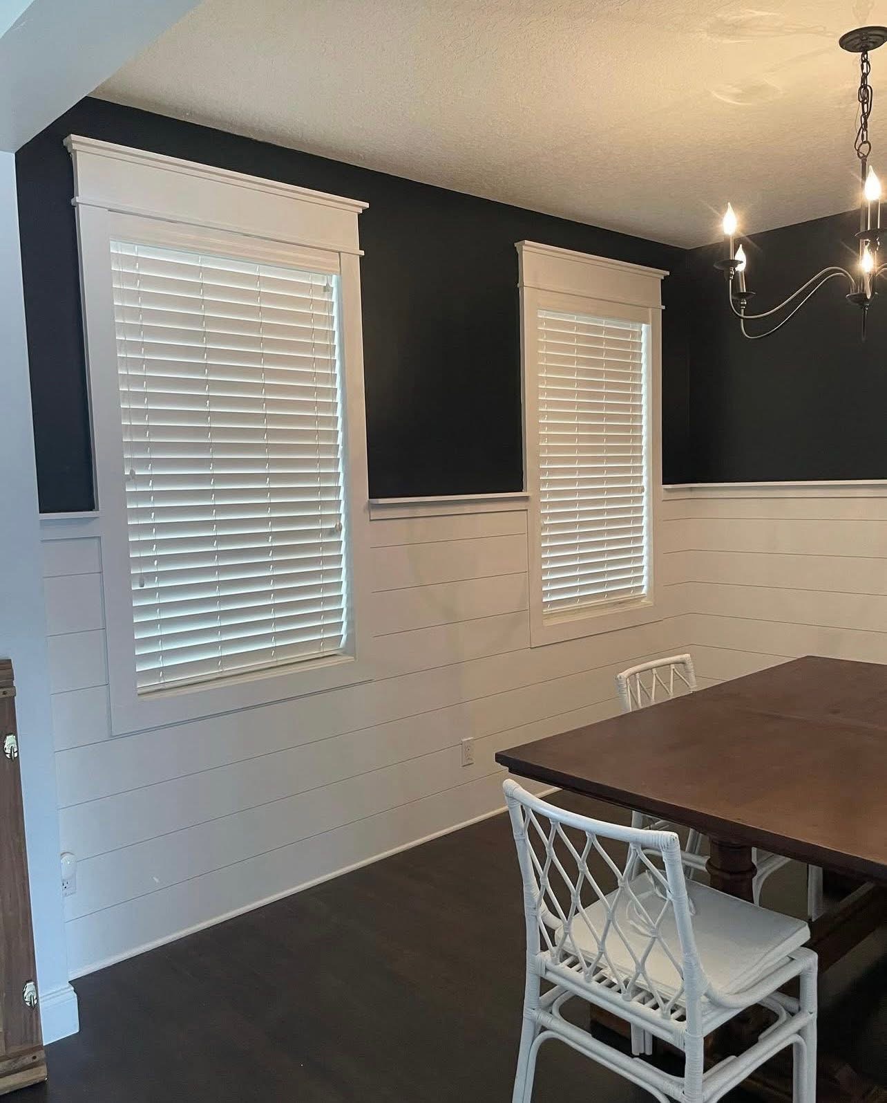 Dining room with shiplap wainscoting and trim work